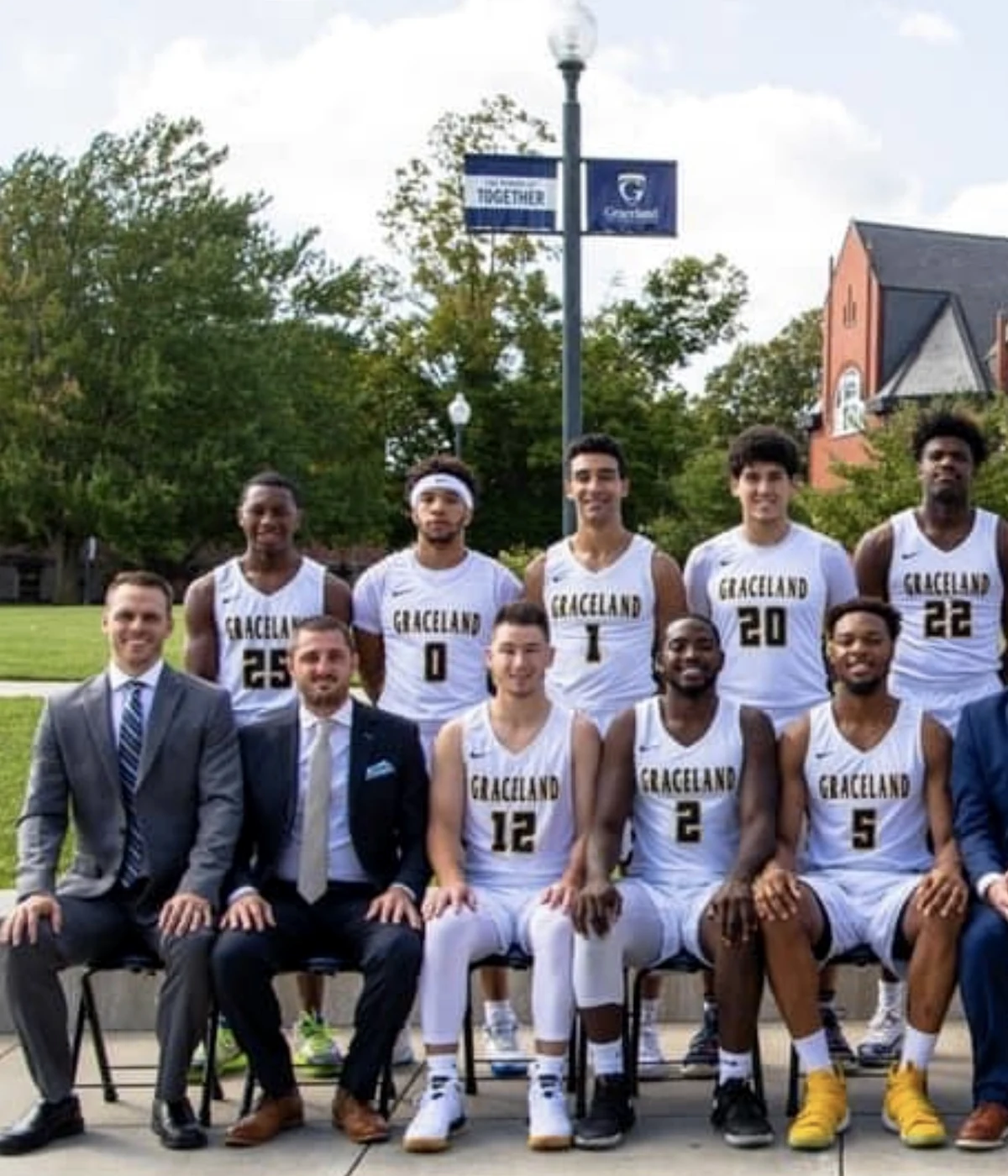 Coach Hood with a college basketball team during his coaching career